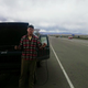 Bobby holds pieces of the broken serpentine belt, which left us stranded on a busy highway.
